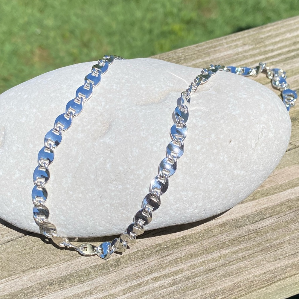 Silver plated link chain necklace 6 mm wide 17.5 inches long. 
Brand new.